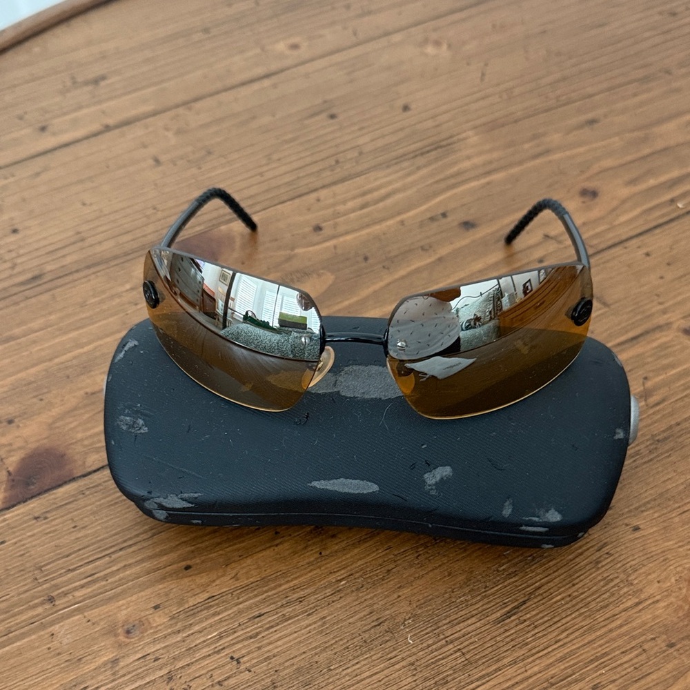 Stylish Sunglasses with Case.  Chanel